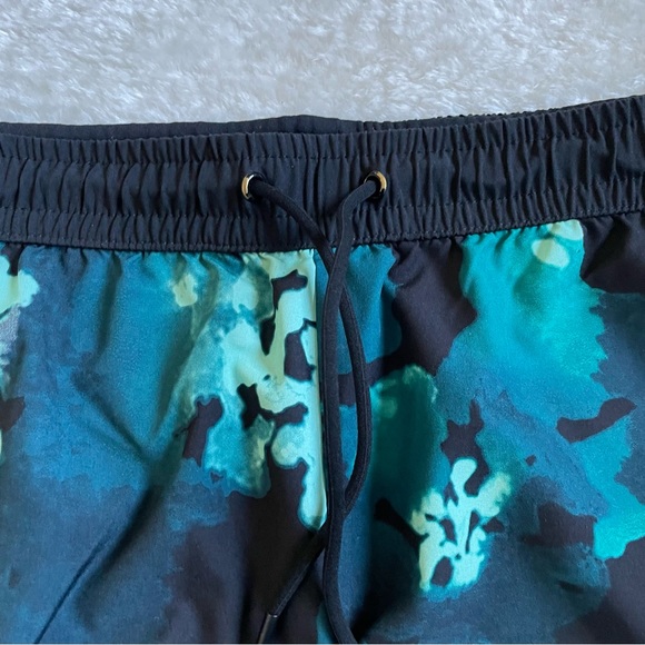 Fabletics Abstract Floral Print Green and Black Running Shorts - Picture 6 of 11